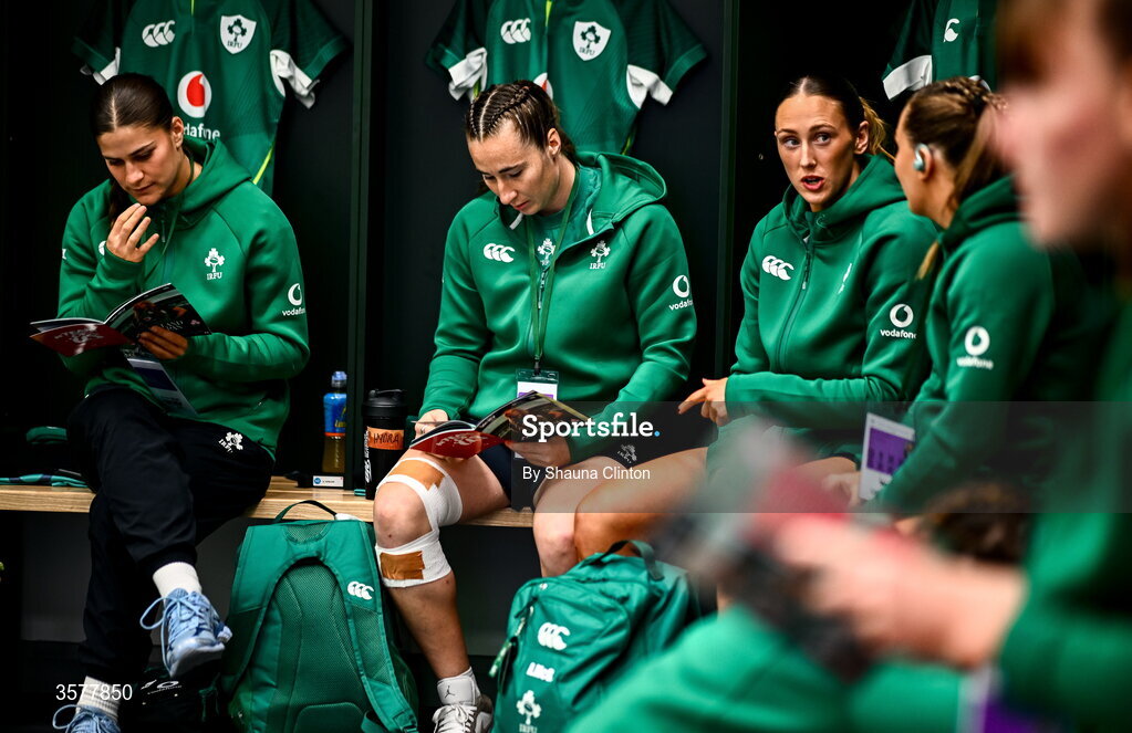 27 September 2026; Eve Higgins, centre, and teammates in the Ireland dressingroom before the WXV Global Series match between Ireland and Japan at Dexcom Stadium in Galway. Photo by Shauna Clinton/Sportsfile