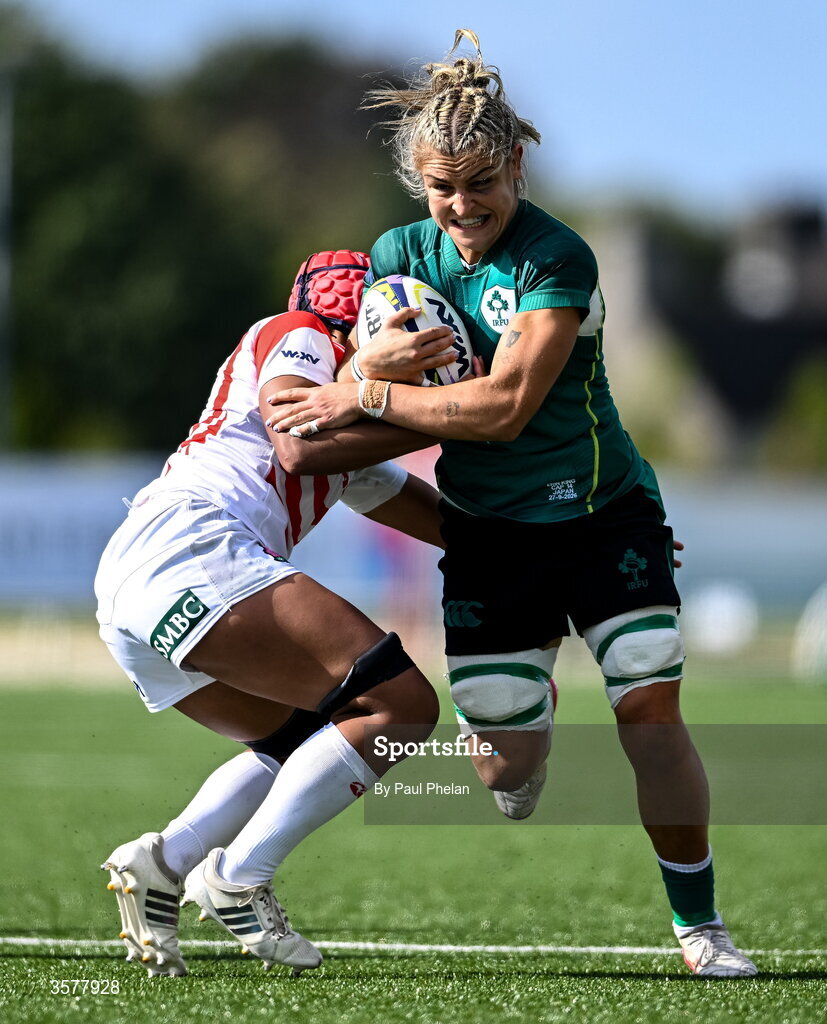27 September 2026; Erin King of Ireland is tackled by Jennifer Nduka of Japan during the WXV Global Series match between Ireland and Japan at Dexcom Stadium in Galway. Photo by Paul Phelan/Sportsfile