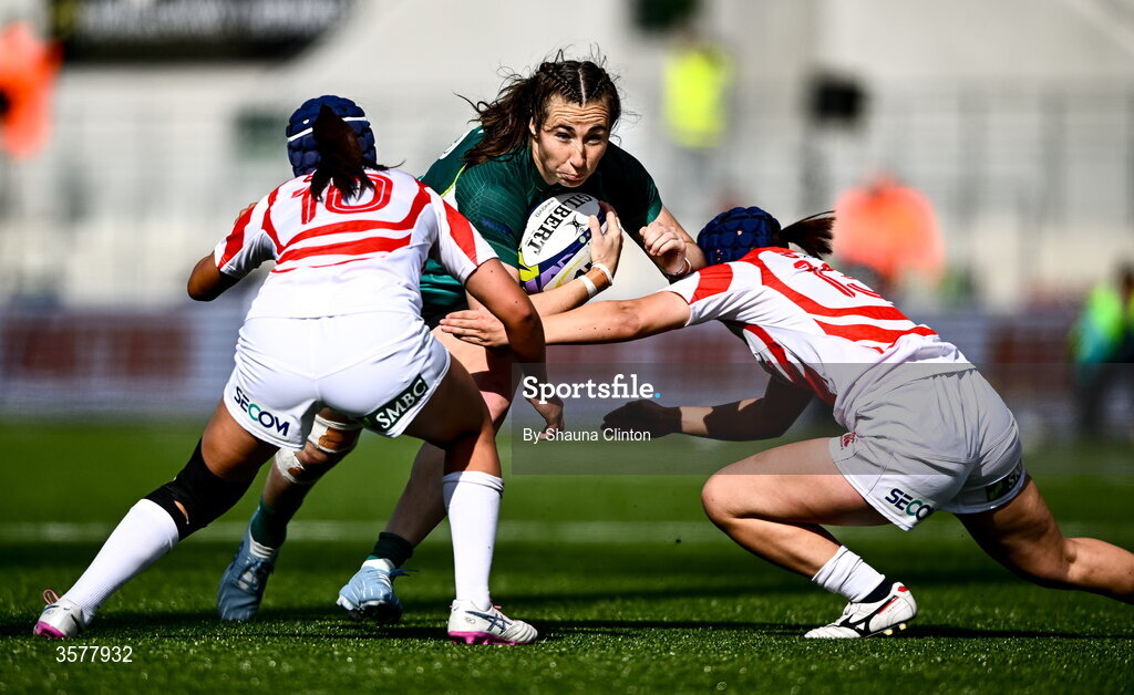 27 September 2026; Eve Higgins of Ireland is tackled by Sawa Harada and Uta Kataoka of Japan during the WXV Global Series match between Ireland and Japan at Dexcom Stadium in Galway. Photo by Shauna Clinton/Sportsfile