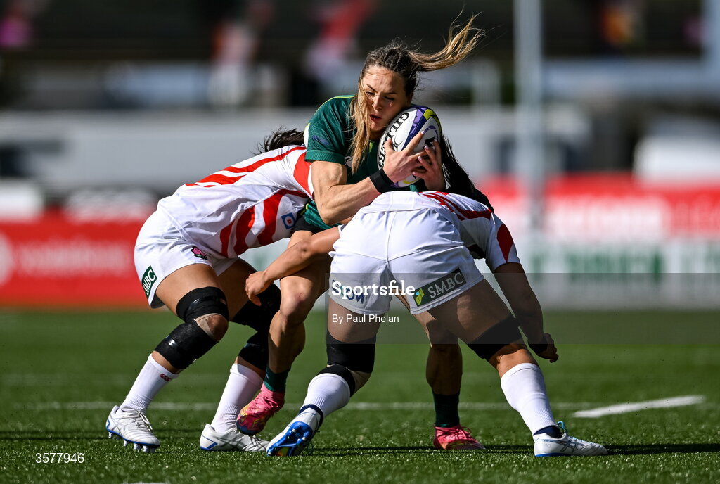 27 September 2026; Béibhinn Parsons of Ireland is tackled by Moe Nagaoka, left, and Nami Asari of Japan during the WXV Global Series match between Ireland and Japan at Dexcom Stadium in Galway. Photo by Paul Phelan/Sportsfile