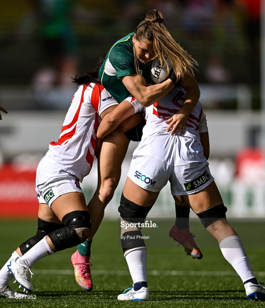 27 September 2026; Béibhinn Parsons of Ireland is tackled by Moe Nagaoka, left, and Nami Asari of Japan during the WXV Global Series match between Ireland and Japan at Dexcom Stadium in Galway. Photo by Paul Phelan/Sportsfile