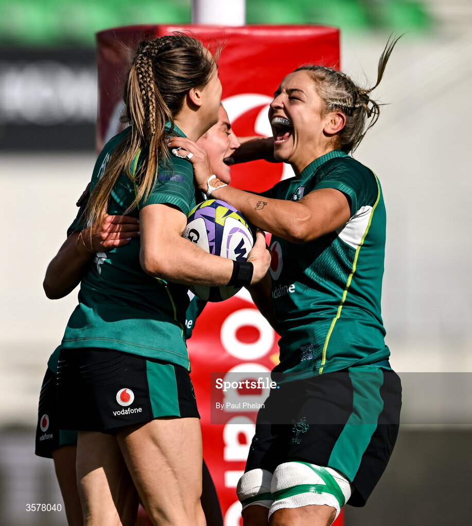 27 September 2026; Béibhinn Parsons of Ireland celebrates with captain Erin King, right, after scoring her second and their side's fifth try, becoming Ireland's record try scorer, during the WXV Global Series match between Ireland and Japan at Dexcom Stadium in Galway. Photo by Paul Phelan/Sportsfile