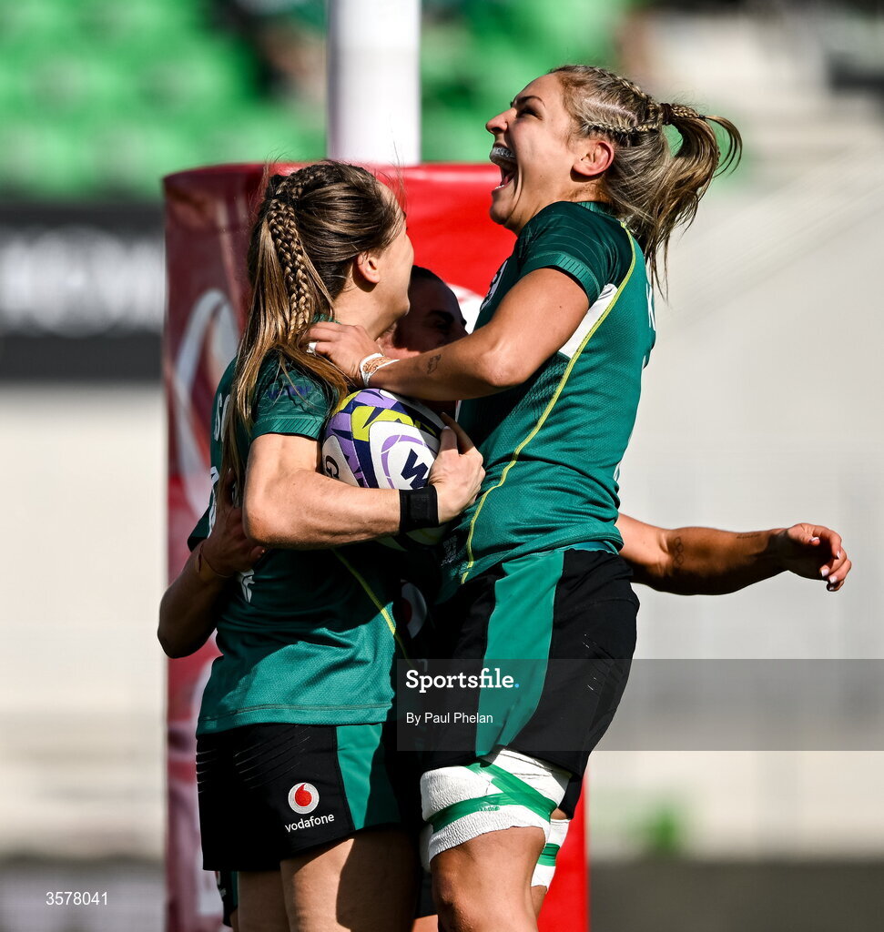 27 September 2026; Béibhinn Parsons of Ireland celebrates with captain Erin King, right, after scoring her second and their side's fifth try, becoming Ireland's record try scorer, during the WXV Global Series match between Ireland and Japan at Dexcom Stadium in Galway. Photo by Paul Phelan/Sportsfile