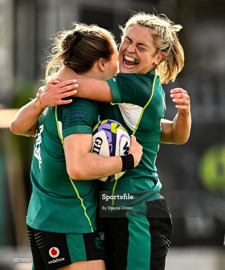 27 September 2026; Béibhinn Parsons of Ireland celebrates with teammate Erin King, right, after scoring her second and their side's fifth try, becoming Ireland's record try scorer, during the WXV Global Series match between Ireland and Japan at Dexcom Stadium in Galway. Photo by Shauna Clinton/Sportsfile
