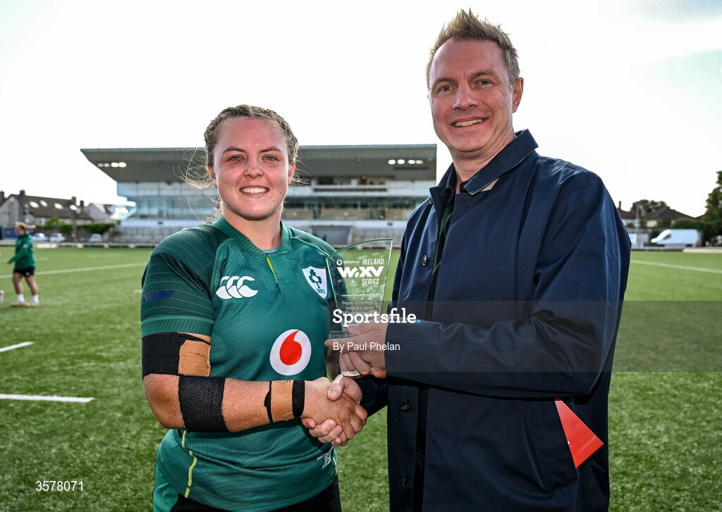 27 September 2026; Brittany Hogan of Ireland is presented with the Vodafone Player of the Match award by Vodafone Ireland consumer director Chris Stagg after the WXV Global Series match between Ireland and Japan at Dexcom Stadium in Galway. Photo by Paul Phelan/Sportsfile