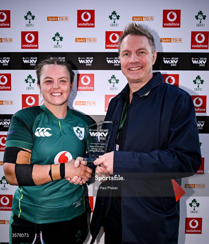 27 September 2026; Brittany Hogan of Ireland is presented with the Vodafone Player of the Match award by Vodafone Ireland consumer director Chris Stagg after the WXV Global Series match between Ireland and Japan at Dexcom Stadium in Galway. Photo by Paul Phelan/Sportsfile