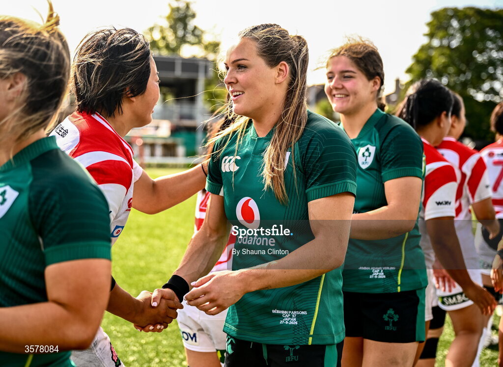 27 September 2026; Béibhinn Parsons of Ireland with Japan players after the WXV Global Series match between Ireland and Japan at Dexcom Stadium in Galway. Photo by Shauna Clinton/Sportsfile