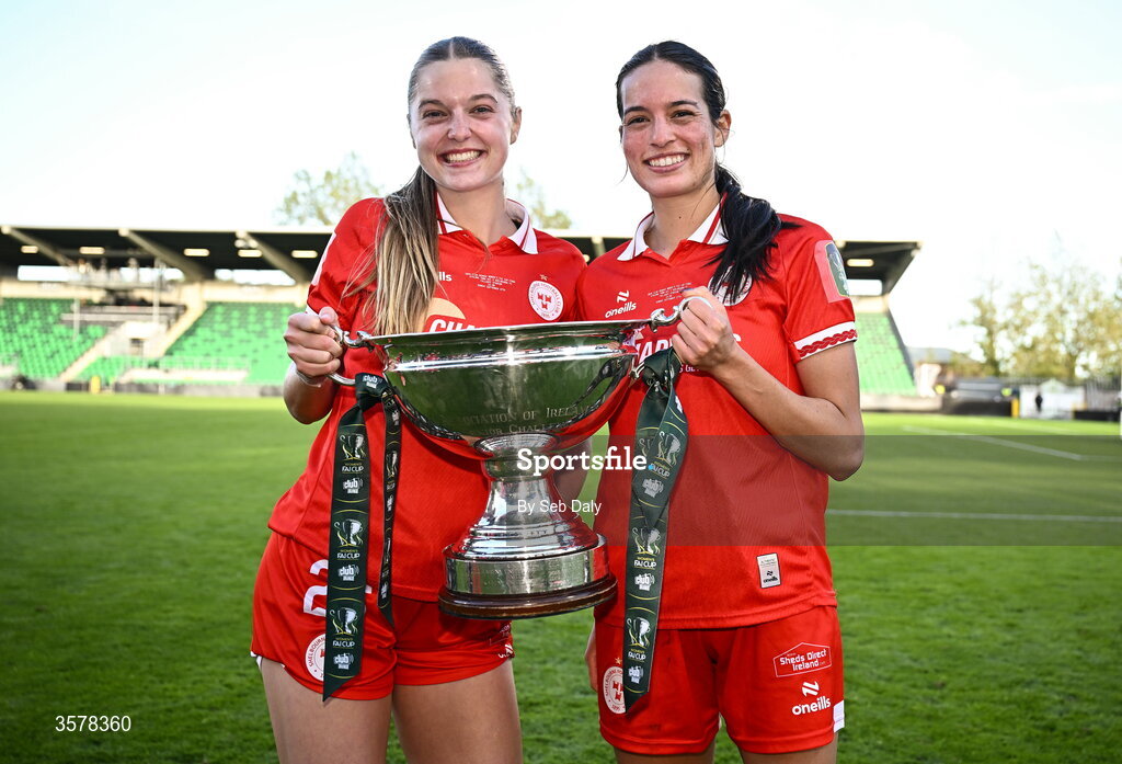 27 September 2026; Shelbourne players Brie Severns, left, and Isabella Flocchini celebrate with the Women's FAI Cup after their side's victory in the 2026 Club Orange Women's FAI Cup final between Athlone Town and Shelbourne at Tallaght Stadium in Dublin. Photo by Seb Daly/Sportsfile