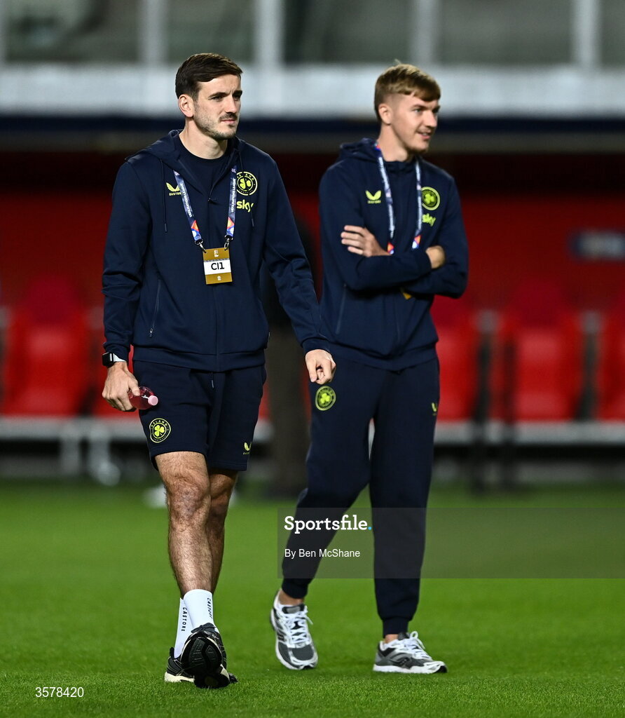 27 September 2026; Liam Kitching, left, and Joel Bagan of Republic of Ireland walk the pitch before the UEFA Nations League B match between Israel and the Republic of Ireland at Nagyerdei Stadion in Debrecen, Hungary. Photo by Ben McShane/Sportsfile