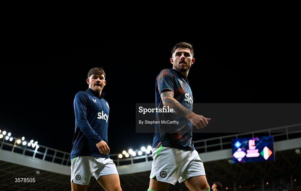 27 September 2026; Owen Elding, left, and Ryan Manning of Republic of Ireland warm up before the UEFA Nations League B match between Israel and the Republic of Ireland at Nagyerdei Stadion in Debrecen, Hungary. Photo by Stephen McCarthy/Sportsfile