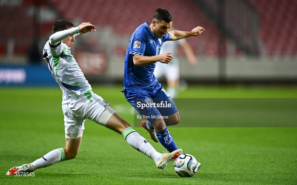 27 September 2026; Oscar Gloukh of Israel is tackled by Jack Moylan of Republic of Ireland the UEFA Nations League B match between Israel and the Republic of Ireland at Nagyerdei Stadion in Debrecen, Hungary. Photo by Ben McShane/Sportsfile