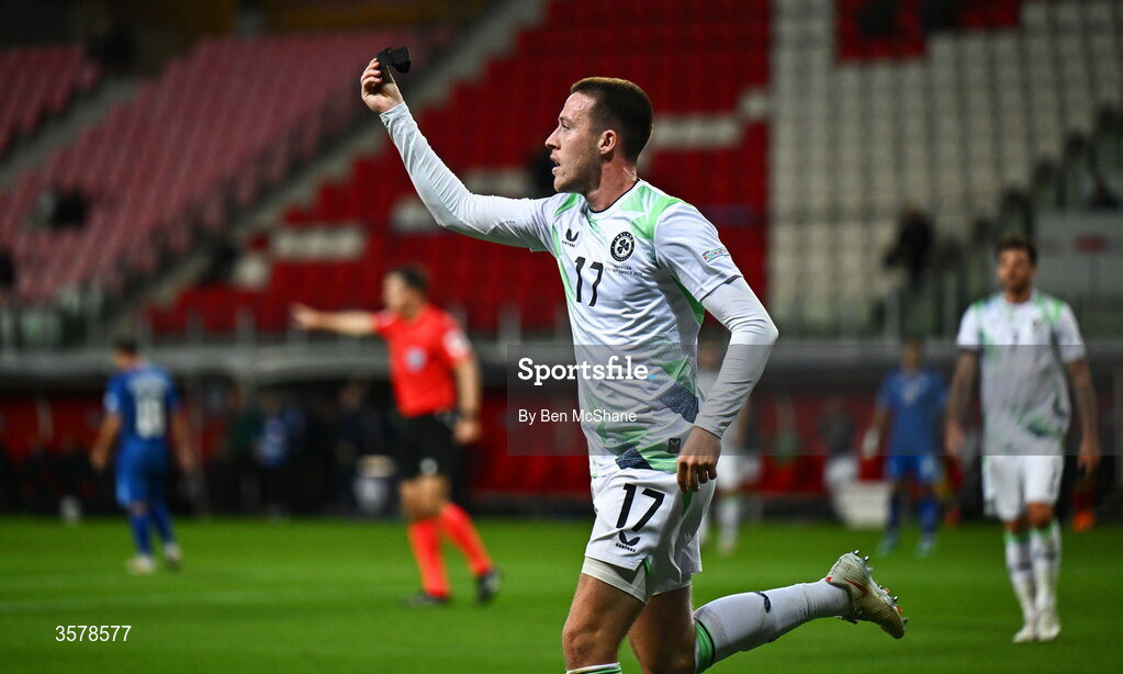 27 September 2026; Jack Moylan of Republic of Ireland, holds up his black armband towards Israeli supporters, worn in recognition for all the lives lost in the conflict in Gaza, after scoring his side's third goal during the UEFA Nations League B match between Israel and the Republic of Ireland at Nagyerdei Stadion in Debrecen, Hungary. Photo by Ben McShane/Sportsfile
