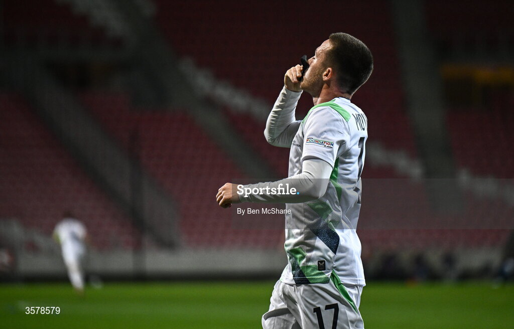 27 September 2026; Jack Moylan of Republic of Ireland, kisses his black armband, worn in recognition for all the lives lost in the conflict in Gaza, after scoring his side's third goal during the UEFA Nations League B match between Israel and the Republic of Ireland at Nagyerdei Stadion in Debrecen, Hungary. Photo by Ben McShane/Sportsfile