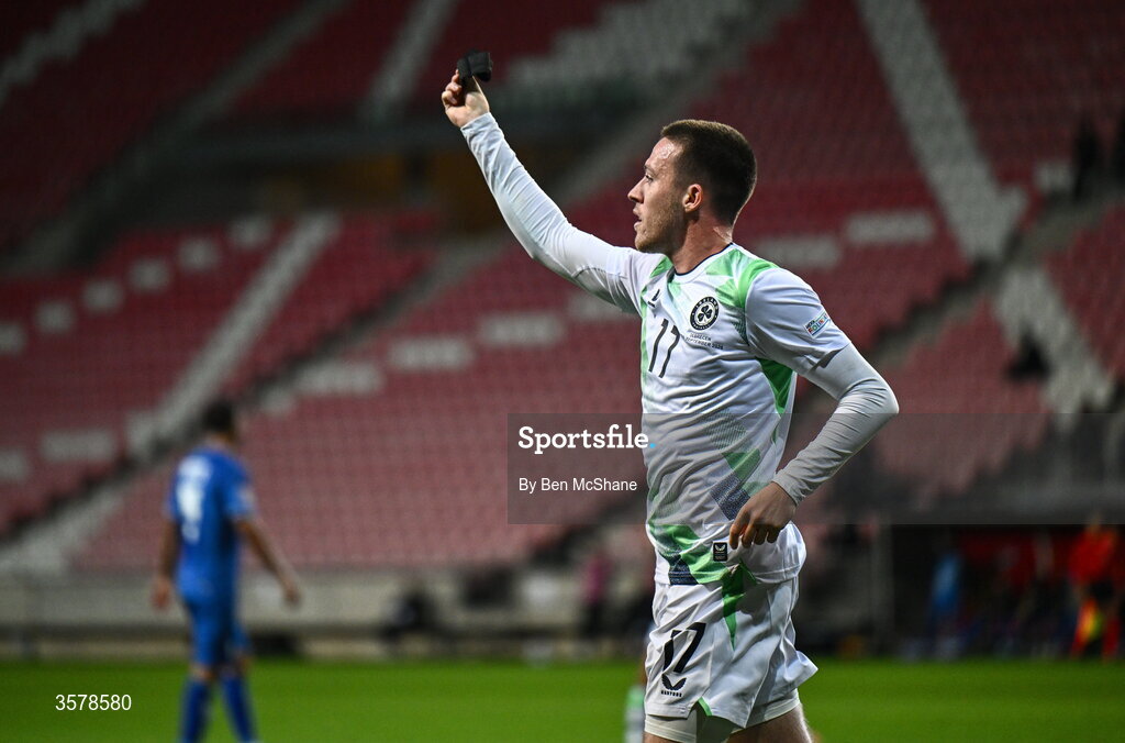27 September 2026; Jack Moylan of Republic of Ireland, holds up his black armband towards Israeli supporters, worn in recognition for all the lives lost in the conflict in Gaza, after scoring his side's third goal during the UEFA Nations League B match between Israel and the Republic of Ireland at Nagyerdei Stadion in Debrecen, Hungary. Photo by Ben McShane/Sportsfile