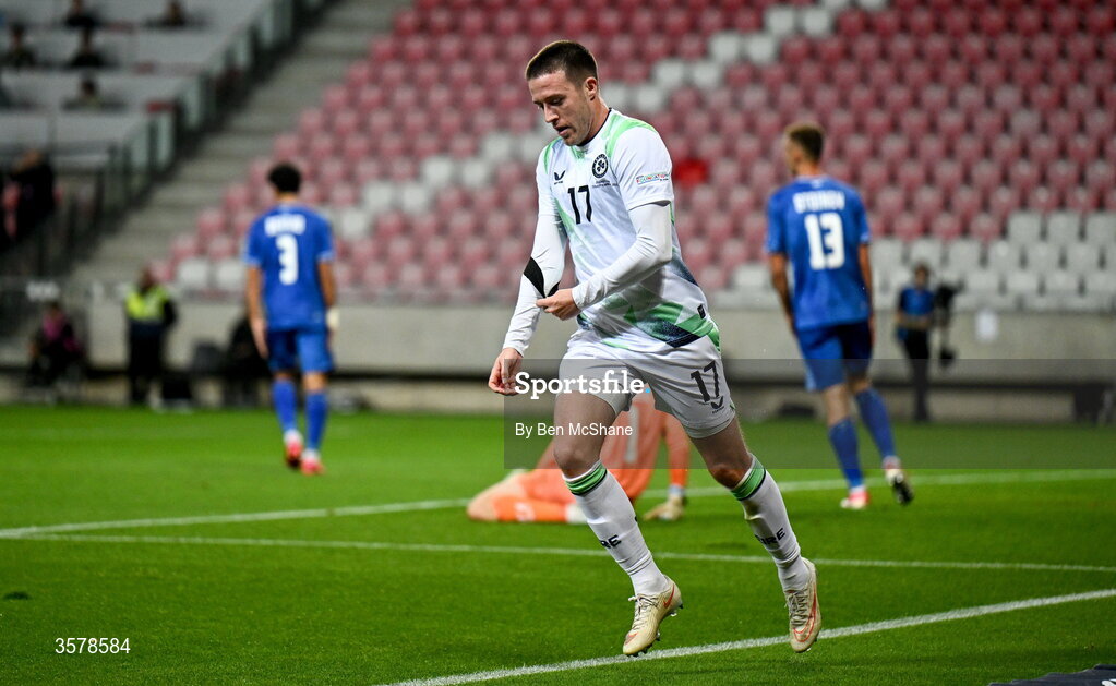 27 September 2026; Jack Moylan of Republic of Ireland, removes his black armband, worn in recognition for all the lives lost in the conflict in Gaza, before showing it to Israeli supporters, after scoring his side's third goal during the UEFA Nations League B match between Israel and the Republic of Ireland at Nagyerdei Stadion in Debrecen, Hungary. Photo by Ben McShane/Sportsfile