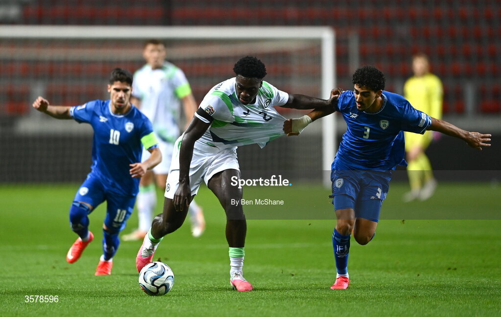 27 September 2026; James Abankwah of Republic of Ireland is tackled by Roy Revivo of Israel during the UEFA Nations League B match between Israel and the Republic of Ireland at Nagyerdei Stadion in Debrecen, Hungary. Photo by Ben McShane/Sportsfile
