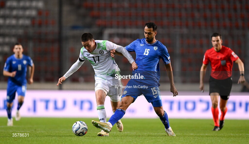 27 September 2026; Jack Moylan of Republic of Ireland is tackled by Eliel Peretz of Israel during the UEFA Nations League B match between Israel and the Republic of Ireland at Nagyerdei Stadion in Debrecen, Hungary. Photo by Stephen McCarthy/Sportsfile