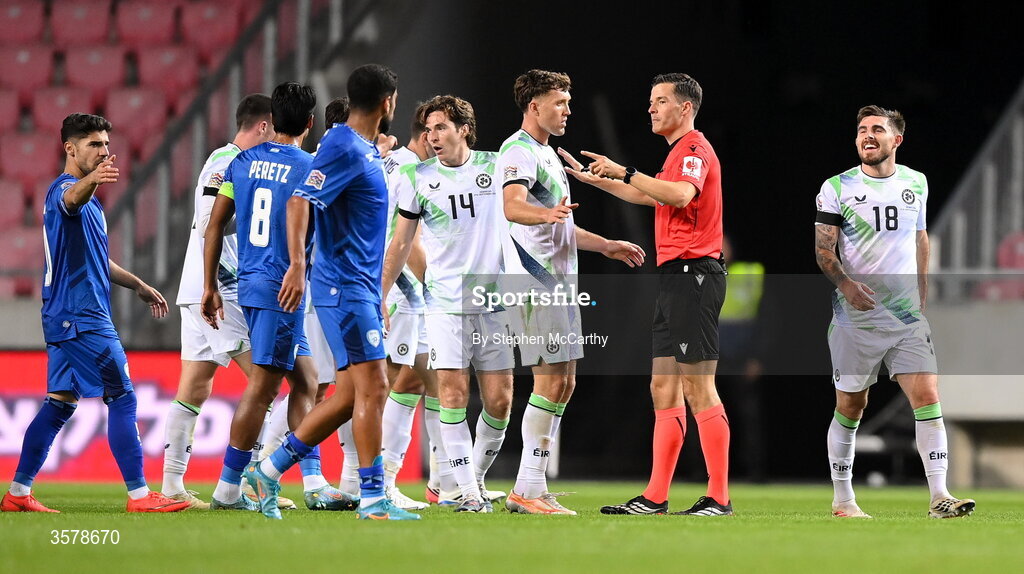 27 September 2026; Dara O'Shea of Republic of Ireland speaks to referee Harm Osmers during the UEFA Nations League B match between Israel and the Republic of Ireland at Nagyerdei Stadion in Debrecen, Hungary. Photo by Stephen McCarthy/Sportsfile