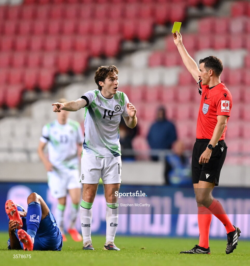 27 September 2026; Conor Coventry of Republic of Ireland is shown a yellow card by Harm Osmers during the UEFA Nations League B match between Israel and the Republic of Ireland at Nagyerdei Stadion in Debrecen, Hungary. Photo by Stephen McCarthy/Sportsfile