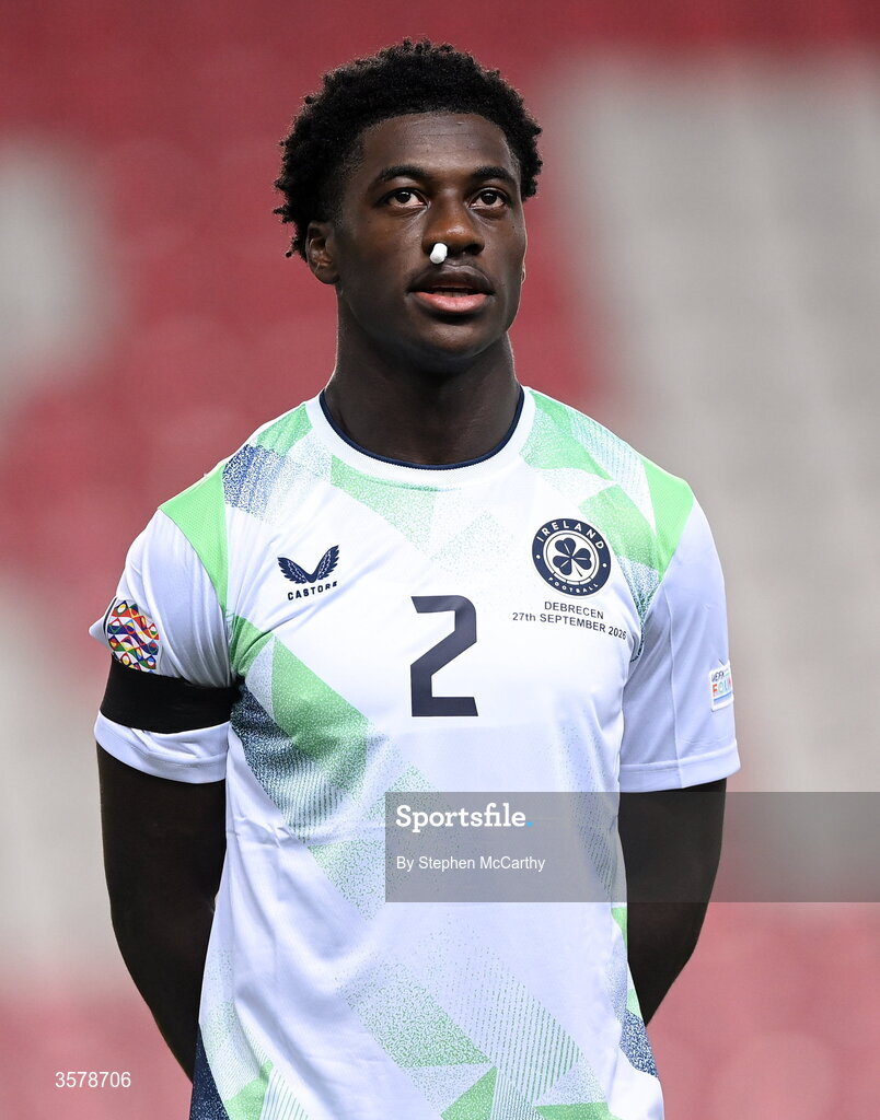 27 September 2026; James Abankwah of Republic of Ireland, wearing a black armband in recognition for all the lives lost in the conflict in Gaza, stands for the national anthem before the UEFA Nations League B match between Israel and the Republic of Ireland at Nagyerdei Stadion in Debrecen, Hungary. Photo by Stephen McCarthy/Sportsfile