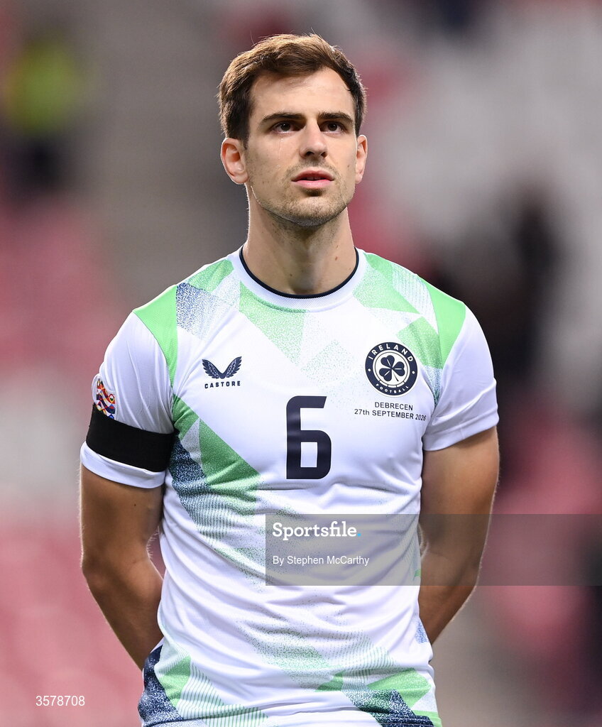 27 September 2026; Jayson Molumby of Republic of Ireland, wearing a black armband in recognition for all the lives lost in the conflict in Gaza, stands for the national anthem before the UEFA Nations League B match between Israel and the Republic of Ireland at Nagyerdei Stadion in Debrecen, Hungary. Photo by Stephen McCarthy/Sportsfile