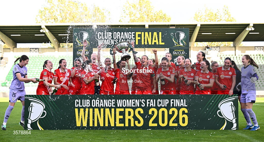 27 September 2026; Shelbourne captain Pearl Slattery and teammate Alex Kavanagh lift the trophy after their side's victory in the 2026 Club Orange Women's FAI Cup final between Athlone Town and Shelbourne at Tallaght Stadium in Dublin. Photo by Seb Daly/Sportsfile