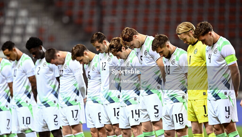 27 September 2026; Republic of Ireland players, wearing black armbands in recognition for all the lives lost in the conflict in Gaza, bow their heads during the Israel national anthem before the UEFA Nations League B match between Israel and the Republic of Ireland at Nagyerdei Stadion in Debrecen, Hungary. Photo by Ben McShane/Sportsfile