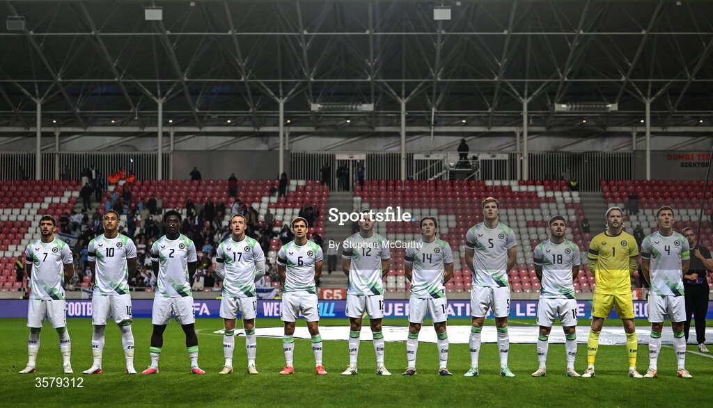 27 September 2026; The Republic of Ireland team, from left, Troy Parrott, Adam Idah, James Abankwah, Jack Moylan, Jayson Molumby, Liam Kitching, Conor Coventry, Jake O'Brien, Ryan Manning, goalkeeper Caoimhín Kelleher and captain Dara O'Shea, wearing black armbands in recognition for all the lives lost in the conflict in Gaza, stand for the playing of the National Anthem before the UEFA Nations League B match between Israel and the Republic of Ireland at Nagyerdei Stadion in Debrecen, Hungary.  Photo by Stephen McCarthy/Sportsfile