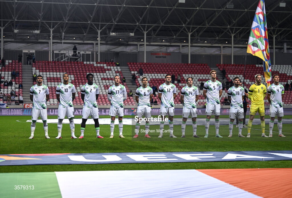 27 September 2026; The Republic of Ireland team, from left, Troy Parrott, Adam Idah, James Abankwah, Jack Moylan, Jayson Molumby, Liam Kitching, Conor Coventry, Jake O'Brien, Ryan Manning, goalkeeper Caoimhín Kelleher and captain Dara O'Shea, wearing black armbands in recognition for all the lives lost in the conflict in Gaza, stand for the playing of the National Anthem before the UEFA Nations League B match between Israel and the Republic of Ireland at Nagyerdei Stadion in Debrecen, Hungary.  Photo by Stephen McCarthy/Sportsfile
