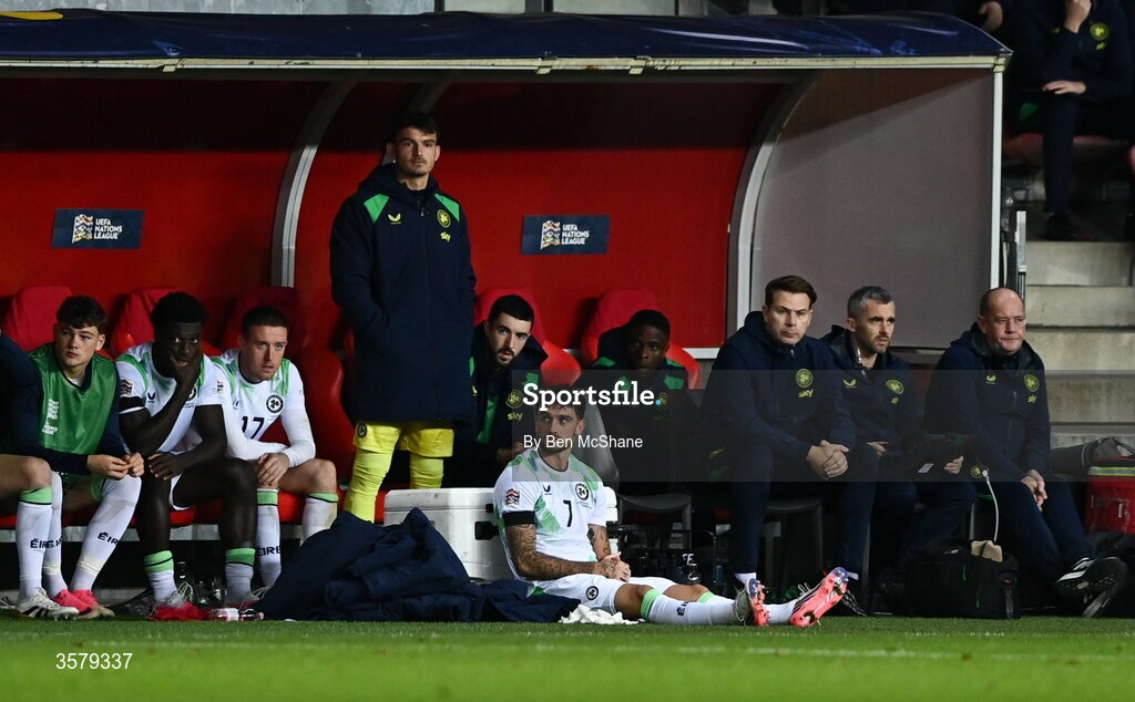 27 September 2026; Troy Parrott of Republic of Ireland sits in front of the Republic of Ireland bench after being substituted in the second half of the UEFA Nations League B match between Israel and the Republic of Ireland at Nagyerdei Stadion in Debrecen, Hungary. Photo by Ben McShane/Sportsfile