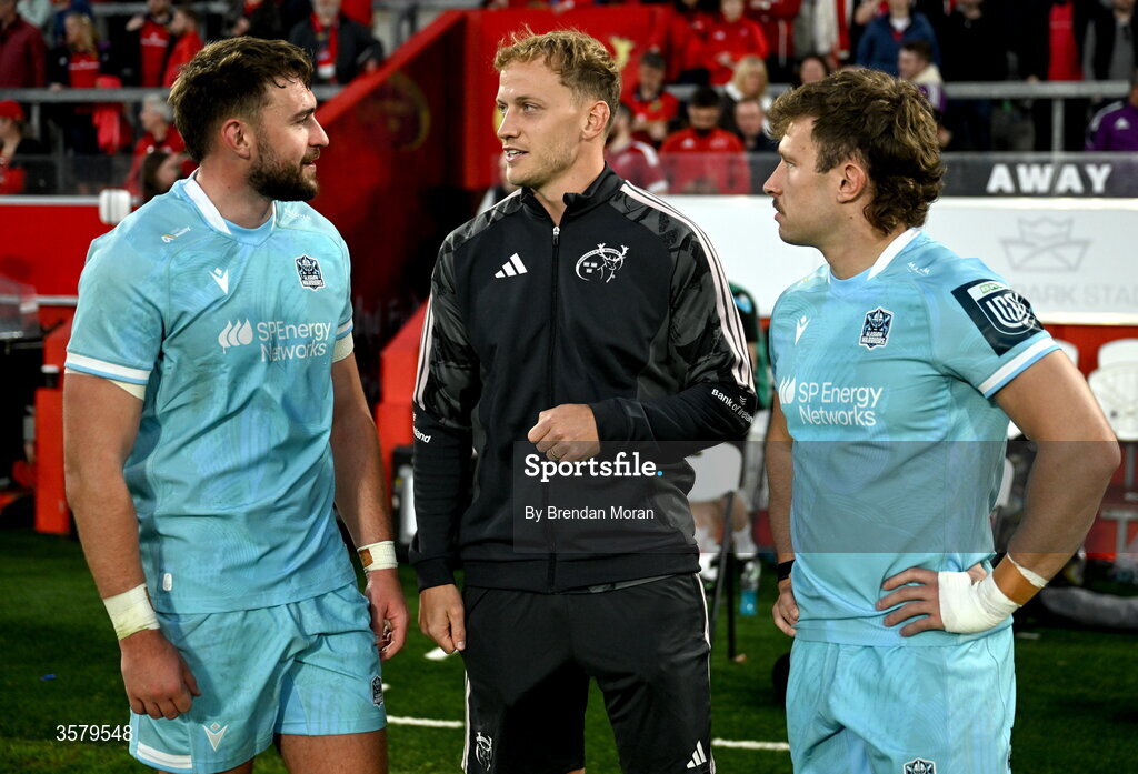 26 September 2026; Mike Haley of Munster, centre, in conversation with Ollie Smith, left, and Kyle Rowe of Glasgow Warriors after the United Rugby Championship match between Munster and Glasgow Warriors at Thomond Park in Limerick. Photo by Brendan Moran/Sportsfile