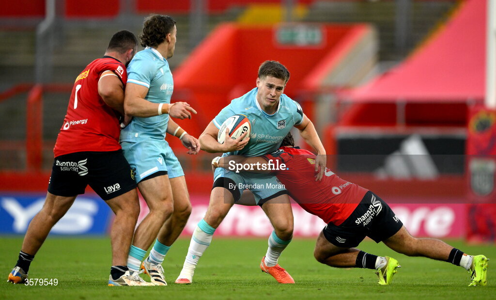 26 September 2026; Dan Lancaster of Glasgow Warriors is tackled by Ben O’Donovan of Munster during the United Rugby Championship match between Munster and Glasgow Warriors at Thomond Park in Limerick. Photo by Brendan Moran/Sportsfile