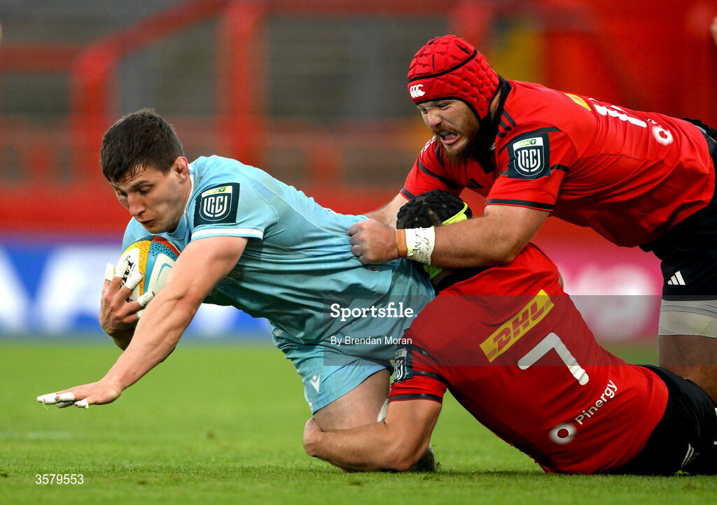 26 September 2026; Rory Darge of Glasgow Warriors is tackled by Marnus van der Merwe and Alex Kendellen of Munster duringing the United Rugby Championship match between Munster and Glasgow Warriors at Thomond Park in Limerick. Photo by Brendan Moran/Sportsfile