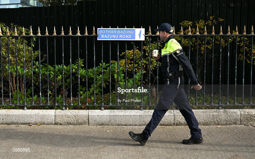 1 October 2026; A member of An Garda Síochána walks past a street sign titled 'Bazunu Road' on Lansdowne Road before the UEFA Nations League B match between the Republic of Ireland and Austria at the Aviva Stadium in Dublin.  Photo by Paul Phelan/Sportsfile