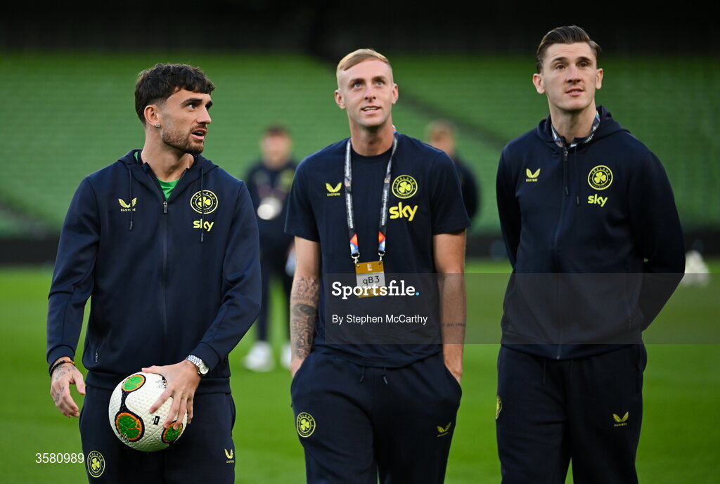 1 October 2026; Republic of Ireland players, from left, Troy Parrott, Killian Phillips and Jimmy Dunne walk the pitch before the UEFA Nations League B match between the Republic of Ireland and Austria at the Aviva Stadium in Dublin. Photo by Stephen McCarthy/Sportsfile