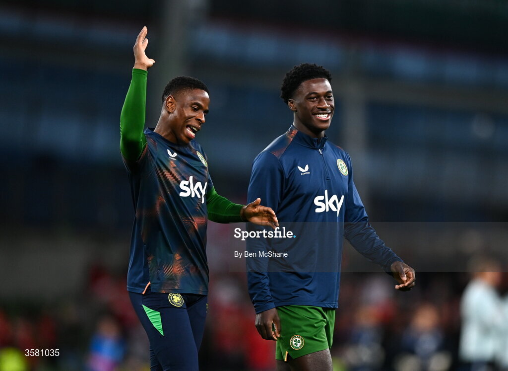 1 October 2026; Chiedozie Ogbene, left, and James Abankwah of Republic of Ireland warm up before the UEFA Nations League B match between the Republic of Ireland and Austria at the Aviva Stadium in Dublin. Photo by Ben McShane/Sportsfile