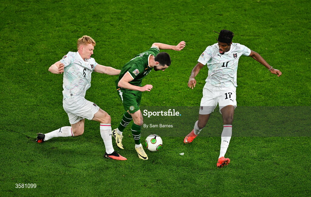 1 October 2026; Finn Azaz of Republic of Ireland in action against Nicolas Seiwald, left, and Carney Chukwuemeka of Austria during the UEFA Nations League B match between the Republic of Ireland and Austria at the Aviva Stadium in Dublin. Photo by Sam Barnes/Sportsfile