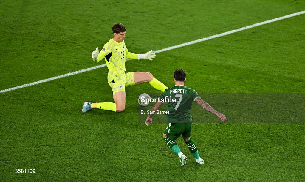 1 October 2026; Troy Parrott of Republic of Ireland shoots to score his side's first goal past Austria goalkeeper Florian Wiegele during the UEFA Nations League B match between the Republic of Ireland and Austria at the Aviva Stadium in Dublin. Photo by Sam Barnes/Sportsfile