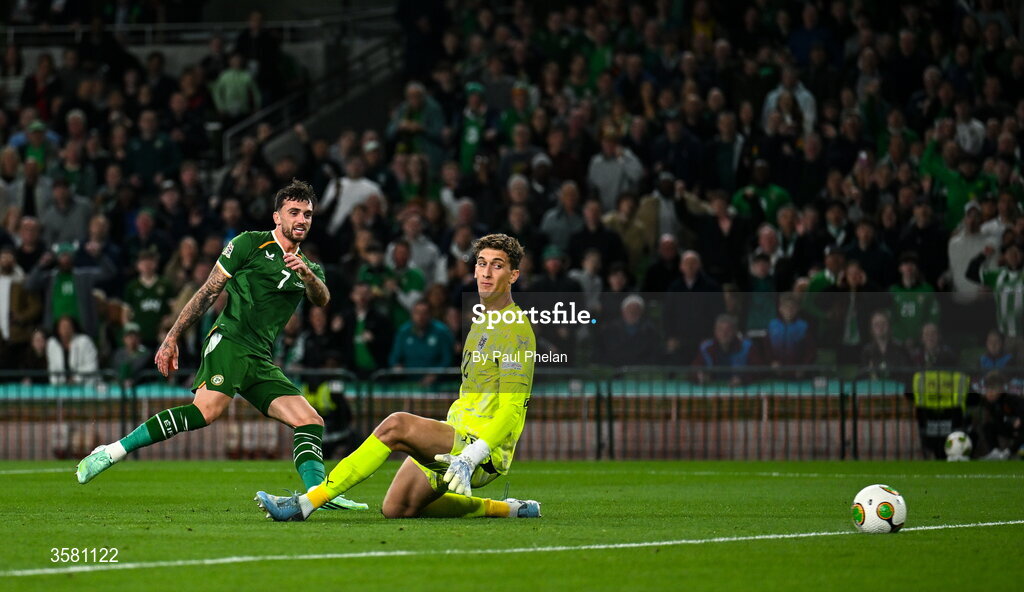 1 October 2026; Troy Parrott of Republic of Ireland shoots to score his side's first goal past Austria goalkeeper Florian Wiegele during the UEFA Nations League B match between the Republic of Ireland and Austria at the Aviva Stadium in Dublin. Photo by Paul Phelan/Sportsfile