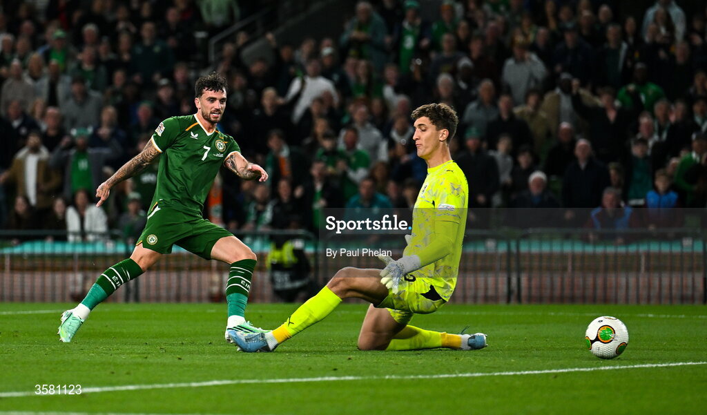 1 October 2026; Troy Parrott of Republic of Ireland shoots to score his side's first goal past Austria goalkeeper Florian Wiegele during the UEFA Nations League B match between the Republic of Ireland and Austria at the Aviva Stadium in Dublin. Photo by Paul Phelan/Sportsfile