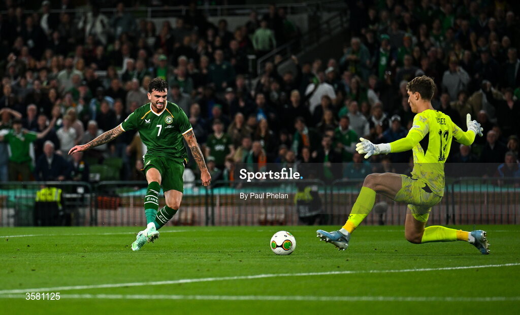 1 October 2026; Troy Parrott of Republic of Ireland shoots to score his side's first goal past Austria goalkeeper Florian Wiegele during the UEFA Nations League B match between the Republic of Ireland and Austria at the Aviva Stadium in Dublin. Photo by Paul Phelan/Sportsfile