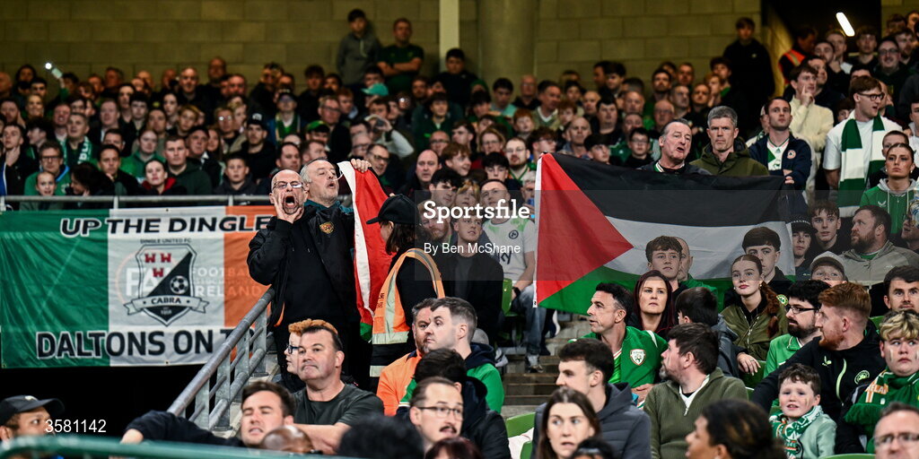 1 October 2026; Protesters hold up a Palestine flag during the UEFA Nations League B match between the Republic of Ireland and Austria at the Aviva Stadium in Dublin. Photo by Ben McShane/Sportsfile