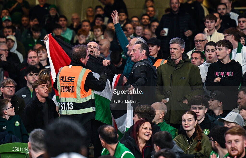 1 October 2026; Protesters hold up a Palestine flag during the UEFA Nations League B match between the Republic of Ireland and Austria at the Aviva Stadium in Dublin. Photo by Ben McShane/Sportsfile