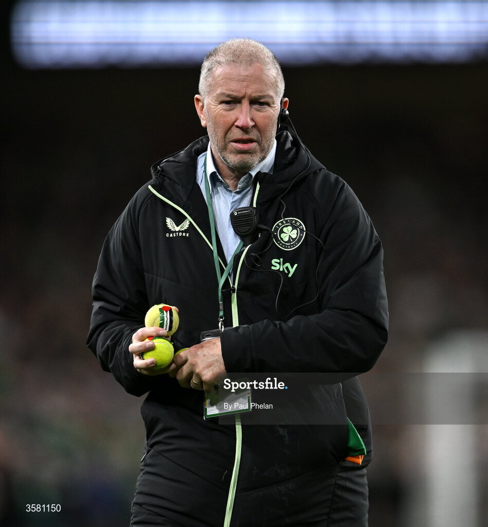 1 October 2026; A member of security collects tennis balls which were thrown onto the pitch in protest during the UEFA Nations League B match between the Republic of Ireland and Austria at the Aviva Stadium in Dublin. Photo by Paul Phelan/Sportsfile
