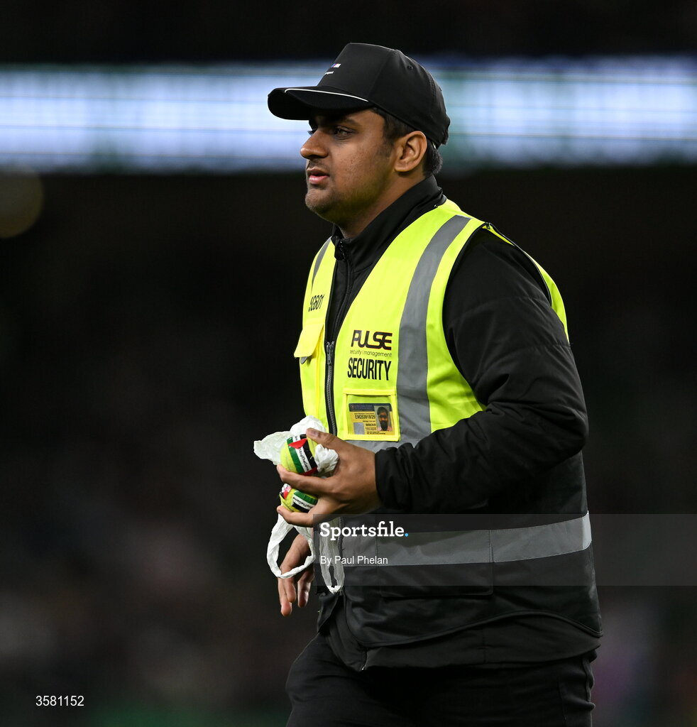 1 October 2026; A member of security holds tennis balls which were thrown onto the pitch in protest during the UEFA Nations League B match between the Republic of Ireland and Austria at the Aviva Stadium in Dublin. Photo by Paul Phelan/Sportsfile