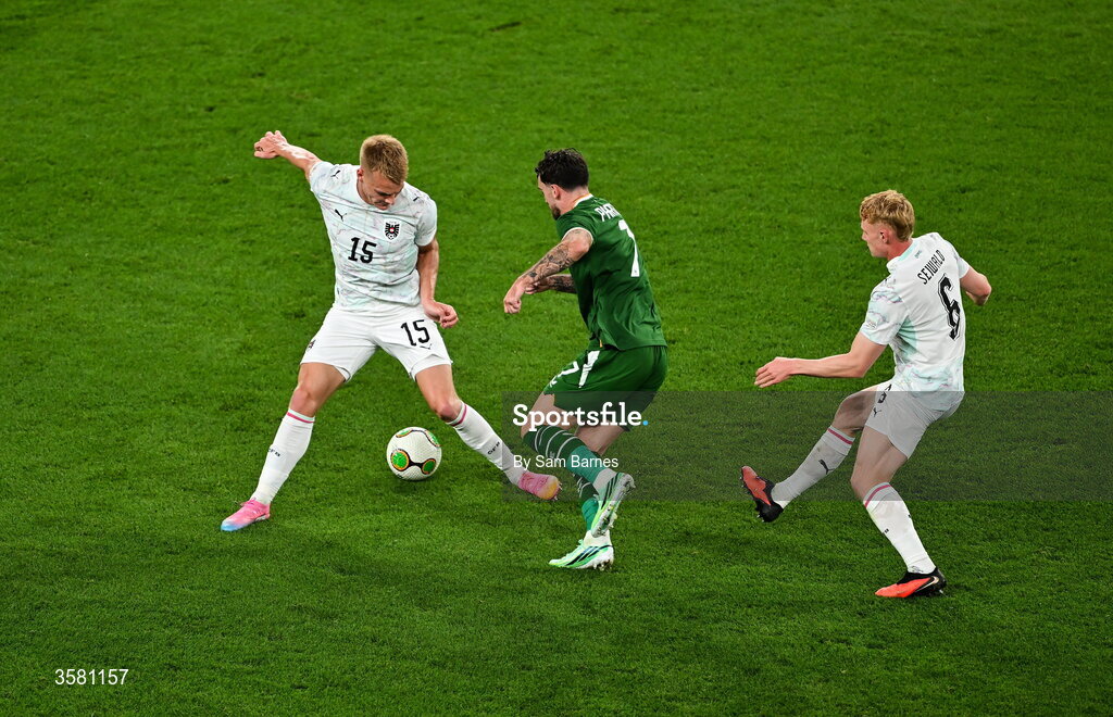1 October 2026; Troy Parrott of Republic of Ireland in action against Philipp Lienhart, left, and Nicolas Seiwald of Austria while on his way to scoring his side's first goal during the UEFA Nations League B match between the Republic of Ireland and Austria at the Aviva Stadium in Dublin. Photo by Sam Barnes/Sportsfile