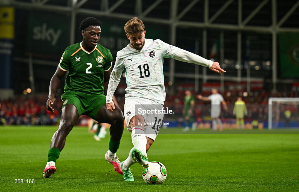 1 October 2026; Romano Schmid of Austria in action against James Abankwah of Republic of Ireland during the UEFA Nations League B match between the Republic of Ireland and Austria at the Aviva Stadium in Dublin. Photo by Ben McShane/Sportsfile