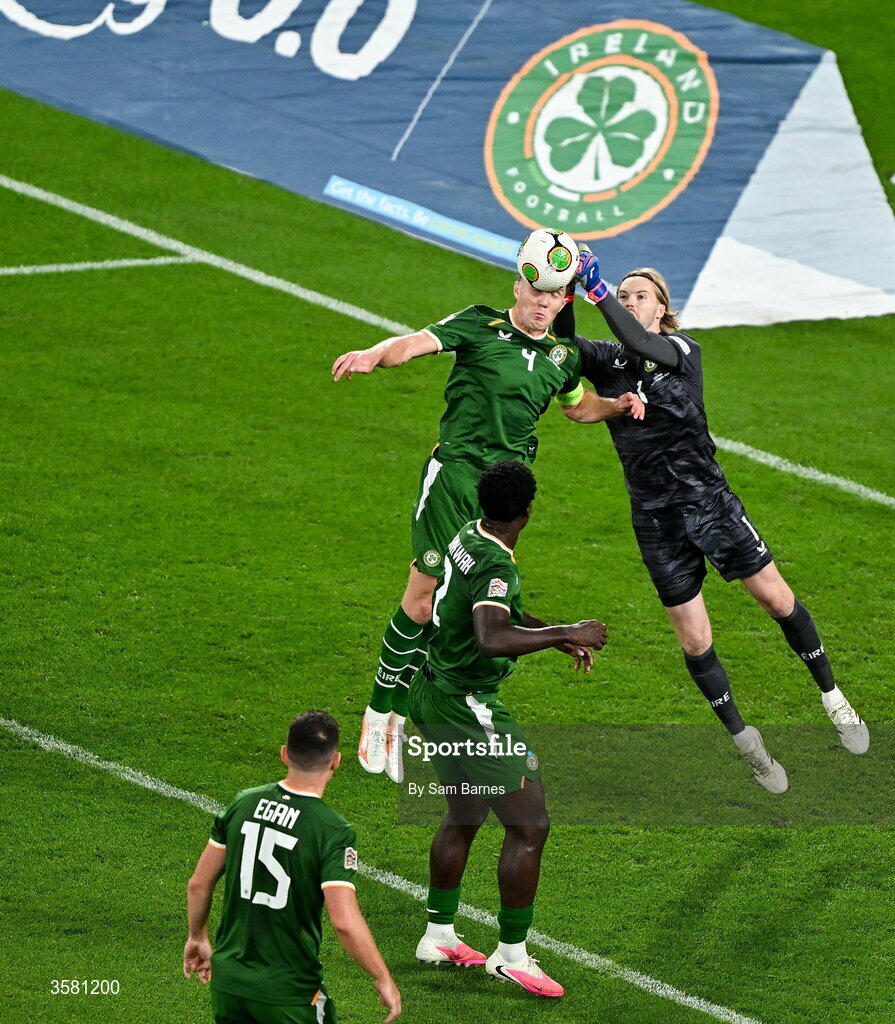 1 October 2026; Republic of Ireland goalkeeper Caoimhín Kelleher punches clear ahead of teammate Dara O'Shea during the UEFA Nations League B match between the Republic of Ireland and Austria at the Aviva Stadium in Dublin. Photo by Sam Barnes/Sportsfile