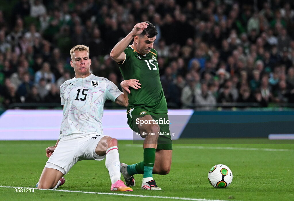 1 October 2026; John Egan of Republic of Ireland is tackled by Philipp Lienhart of Austria during the UEFA Nations League B match between the Republic of Ireland and Austria at the Aviva Stadium in Dublin. Photo by Stephen McCarthy/Sportsfile