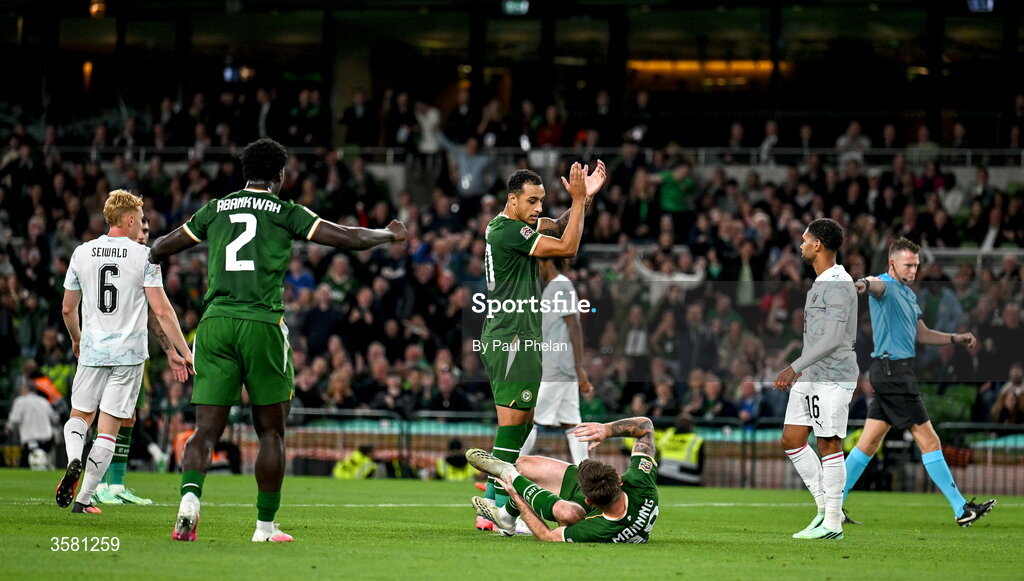 1 October 2026; Adam Idah of Republic of Ireland celebrates as referee Allard Lindhout signals for a penalty after a foul on Ryan Manning of Republic of Ireland, bottom, during the UEFA Nations League B match between the Republic of Ireland and Austria at the Aviva Stadium in Dublin. Photo by Paul Phelan/Sportsfile